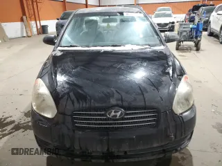 2007 Hyundai Accent GL z VIN KMHCN45C87U142295, wystawiony jako Copart lot #86149894 z przebiegiem 325 738 mil mil oraz Szkoda całkowita • Salvage title. Historia ofert i sprzedaży dostępna na DreamBid. Obrazek 5.