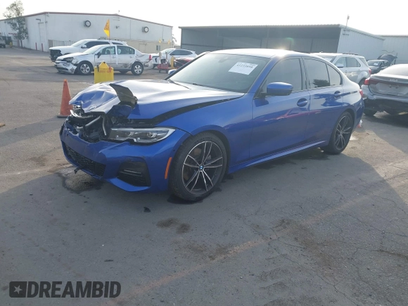 2019 BMW 3 Series 330i xDrive with VIN WBA5R7C50KAE82705, listed as a IAAI auction lot 41233898 with 69,505 mi miles. Bid and sale history available at carsss.com. Image 2.