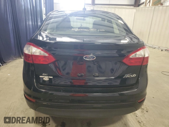 2019 Ford Fiesta SE z VIN 3FADP4BJ9KM151046, wystawiony jako Copart lot #56862255 z przebiegiem 77 002 mil mil oraz Czysty tytuł • Clean title. Historia ofert i sprzedaży dostępna na DreamBid. Obrazek 6.