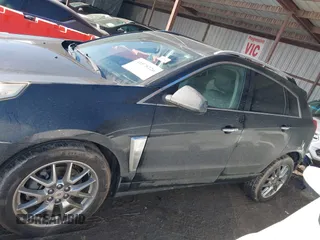 2014 Cadillac SRX Premium Collection z VIN 3GYFNDE34ES581728, wystawiony jako IAAI lot #41578226 z przebiegiem 121 118 mil mil oraz . Historia ofert i sprzedaży dostępna na DreamBid. Obrazek 15.