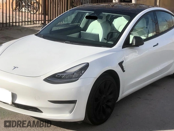 2021 Tesla Model 3 Standard Range Plus with VIN 5YJ3E1EA2MF854372, listed as a Copart auction lot 56435825 with 44,637 mi miles and Salvage Title. Bid and sale history available at DreamBid. Image 2.