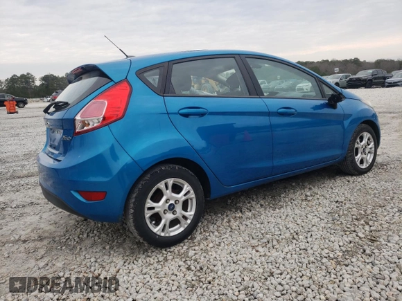 2014 Ford Fiesta SE z VIN 3FADP4EJ3EM232818, wystawiony jako Copart lot #42742745 z przebiegiem 122 987 mil mil oraz Szkoda całkowita • Salvage title. Historia ofert i sprzedaży dostępna na DreamBid. Obrazek 3.