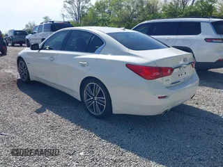 2014 Infiniti Q50 Hybrid Sport with VIN JN1AV7AR0EM703550, listed as a IAAI auction lot 42212384 with 79,308 mi miles and . Bid and sale history available at carsss.com. Image 3.