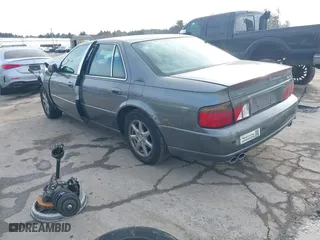 2003 Cadillac Seville Luxury SLS with VIN 1G6KS54Y63U167768, listed as a IAAI auction lot 41699674 with 112,755 mi miles. Bid and sale history available at carsss.com. Image 3.