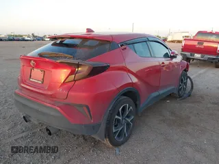 2022 Toyota C-HR XLE with VIN NMTKHMBX8NR147558, listed as a IAAI auction lot 41845282 with 32,875 mi miles and . Bid and sale history available at DreamBid. Image 4.