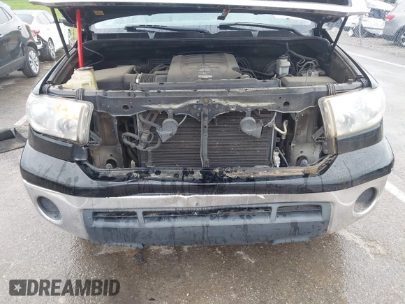2012 Toyota Tundra z VIN 5TFRM5F15CX040630, wystawiony jako IAAI lot #42213728 z przebiegiem 242 469 mil mil oraz . Historia ofert i sprzedaży dostępna na DreamBid. Obrazek 10.