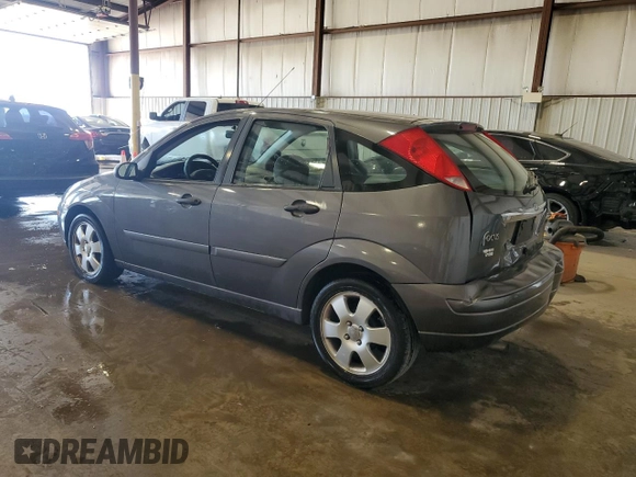 2002 Ford Focus ZX5 z VIN 3FAFP37352R180981, wystawiony jako Copart lot #55856125 z przebiegiem 59 785 mil mil oraz Szkoda całkowita • Salvage title. Historia ofert i sprzedaży dostępna na DreamBid. Obrazek 2.