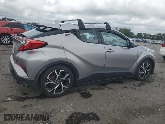 2018 Toyota C-HR XLE with VIN NMTKHMBX9JR002751, listed as a Copart auction lot 55694125 with 114,790 mi miles and Salvage title. Bid and sale history available at DreamBid. Image 3.