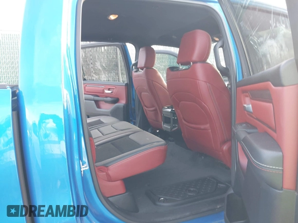 2022 Ram 1500 Rebel z VIN 1C6SRFLT0NN177124, wystawiony jako IAAI lot #41575076 z przebiegiem 40 065 mil mil oraz . Historia ofert i sprzedaży dostępna na DreamBid. Obrazek 8.