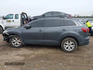2015 Mazda CX-9 Touring with VIN JM3TB2CA0F0463313, listed as a IAAI auction lot 41822436 with 145,302 mi miles. Bid and sale history available at carsss.com. Image 14.