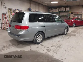2009 Honda Odyssey EX-L with VIN 5FNRL38789B015524, listed as a IAAI auction lot 42135465 with 242,005 mi miles. Bid and sale history available at carsss.com. Image 4.