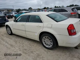 2008 Chrysler 300 LX with VIN 2C3LA43RX8H327674, listed as a Copart auction lot 74428474 with 40,559 mi miles and Salvage Title. Bid and sale history available at carsss.com. Image 2.