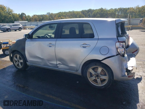 2012 Scion xD with VIN JTKKU4B48C1027734, listed as a Copart auction lot 73393334 with 231,371 mi miles and Salvage Title. Bid and sale history available at DreamBid. Image 2.