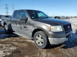 2005 Ford F-150 XLT with VIN 1FTPX12555FB05467, listed as a Copart auction lot 45712335 with 401,186 mi miles and Salvage Title. Bid and sale history available at carsss.com. Image 4.
