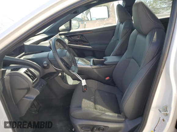 2024 Toyota bZ4X XLE with VIN JTMABACA2RA070499, listed as a Copart auction lot 59914835 with 23,530 mi miles and Salvage title. Bid and sale history available at DreamBid. Image 7.