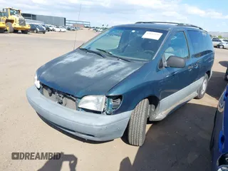 1998 Toyota Sienna LE with VIN 4T3ZF13CXWU049115, listed as a IAAI auction lot 42193159 with 194,313 mi miles and . Bid and sale history available at DreamBid. Image 2.