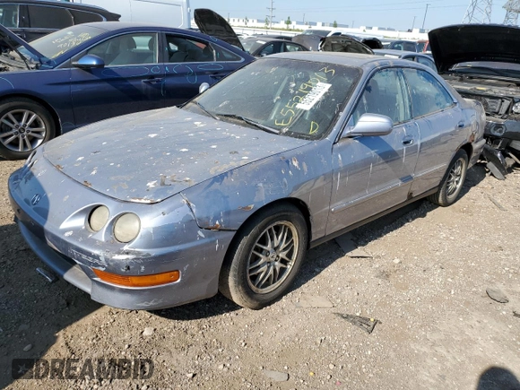 1999 Acura Integra z VIN JH4DB7668XS005069, wystawiony jako Copart lot #61384394 z przebiegiem 207 353 mil mil oraz Szkoda całkowita • Salvage title. Historia ofert i sprzedaży dostępna na DreamBid. Obrazek 1.