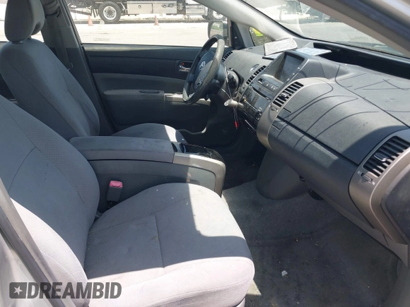 2008 Toyota Prius z VIN JTDKB20U183378002, wystawiony jako IAAI lot #42408794 z przebiegiem 227 839 mil mil oraz . Historia ofert i sprzedaży dostępna na DreamBid. Obrazek 5.