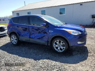 2013 Ford Escape SEL with VIN 1FMCU9HX7DUA78826, listed as a Copart auction lot 53275325 with 128,650 mi miles and Salvage title. Bid and sale history available at DreamBid. Image 4.
