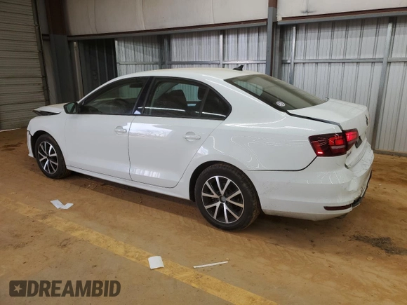 2016 Volkswagen Jetta Sedan 1.4T SE with VIN 3VWD67AJ0GM395589, listed as a Copart auction lot 47668275 with 76,221 mi miles and Salvage Title. Bid and sale history available at carsss.com. Image 2.