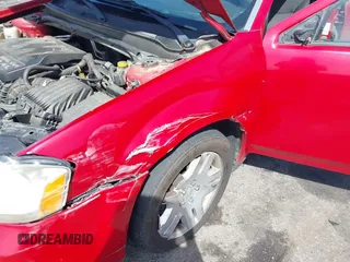 2013 Dodge Avenger SE with VIN 1C3CDZABXDN529054, listed as a IAAI auction lot 41881632 with 179,519 mi miles and . Bid and sale history available at DreamBid. Image 6.