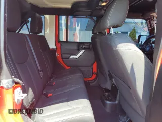 2018 Jeep Wrangler Unlimited Sahara with VIN 1C4BJWEG4JL802145, listed as a Copart auction lot 61931555 with 119,681 mi miles and Salvage title. Bid and sale history available at DreamBid. Image 11.