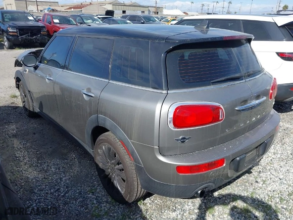 2016 MINI Cooper Clubman with VIN WMWLN5C56G2E30309, listed as a IAAI auction lot 41772501 with 67,584 mi miles. Bid and sale history available at carsss.com. Image 3.