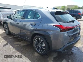 2021 Lexus UX 250h with VIN JTHP9JBH1M2040593, listed as a IAAI auction lot 42024493 with 33,394 mi miles and . Bid and sale history available at DreamBid. Image 3.