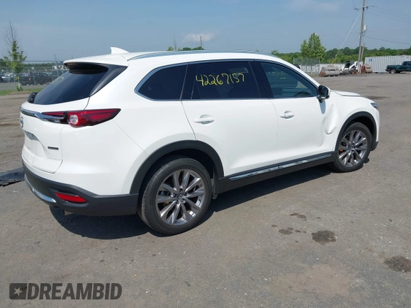 2021 Mazda CX-9 Grand Touring z VIN JM3TCBDY8M0537986, wystawiony jako IAAI lot #42267157 z przebiegiem 25 375 mil mil oraz . Historia ofert i sprzedaży dostępna na DreamBid. Obrazek 4.