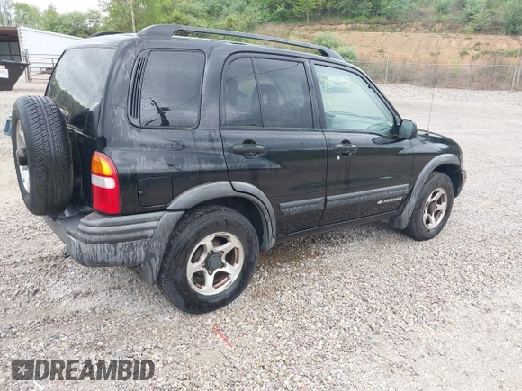 2004 Chevrolet Tracker ZR2 with VIN 2CNBJ734646907924, listed as a IAAI auction lot 42088809 with 98,797 mi miles and . Bid and sale history available at DreamBid. Image 4.