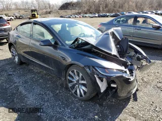 2025 Tesla Model 3 Long Range with VIN 5YJ3E1EB6SF921092, listed as a Copart auction lot 46918025 with 1,403 mi miles and Salvage Title. Bid and sale history available at DreamBid. Image 4.