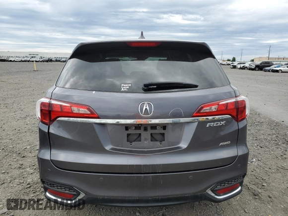 2018 Acura RDX Advance with VIN 5J8TB4H79JL004503, listed as a Copart auction lot 58496815 with 69,566 mi miles and Salvage title. Bid and sale history available at DreamBid. Image 6.