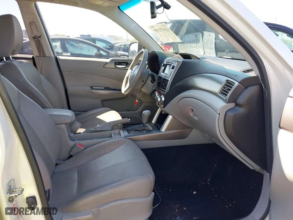 2011 Subaru Forester 2.5X Limited with VIN JF2SHBEC7BH778799, listed as a IAAI auction lot 41973395 with 216,944 mi miles. Bid and sale history available at carsss.com. Image 5.