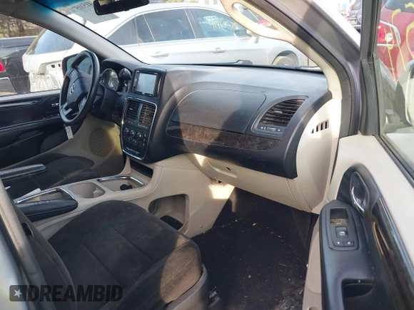 2013 Dodge Grand Caravan SXT with VIN 2C4RDGCG8DR551723, listed as a IAAI auction lot 41510574 with 183,432 mi miles and . Bid and sale history available at DreamBid. Image 5.