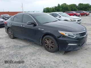 2020 Kia Optima LX with VIN 5XXGT4L35LG384086, listed as a IAAI auction lot 42319644 with 124,816 mi miles and . Bid and sale history available at DreamBid. Image 1.