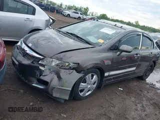 2010 Honda Civic LX with VIN 19XFA1F58AE086425, listed as a IAAI auction lot 42225137 with 186,755 mi miles and . Bid and sale history available at DreamBid. Image 2.