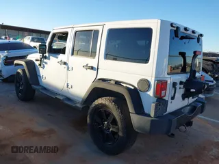 2014 Jeep Wrangler Unlimited Sahara with VIN 1C4BJWEG0EL273475, listed as a IAAI auction lot 41515425 with 128,900 mi miles. Bid and sale history available at carsss.com. Image 3.