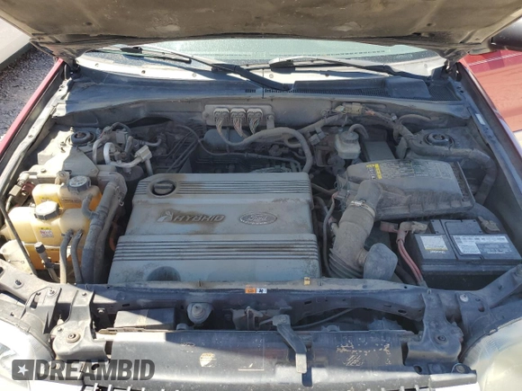 2007 Ford Escape Hybrid z VIN 1FMCU59H77KA61881, wystawiony jako Copart lot #64988665 z przebiegiem 242 536 mil mil oraz Czysty tytuł • Clean title. Historia ofert i sprzedaży dostępna na DreamBid. Obrazek 11.