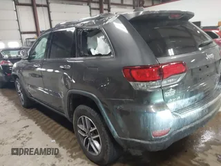 2021 Jeep Grand Cherokee 80th Anniversary with VIN 1C4RJFBG7MC513588, listed as a IAAI auction lot 41441227 with 49,143 mi miles and . Bid and sale history available at DreamBid. Image 3.