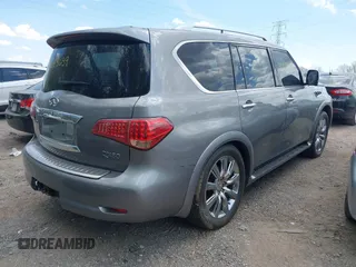 2014 Infiniti QX80 with VIN JN8AZ2NE4E9064351, listed as a IAAI auction lot 42123639 with 164,540 mi miles. Bid and sale history available at carsss.com. Image 4.