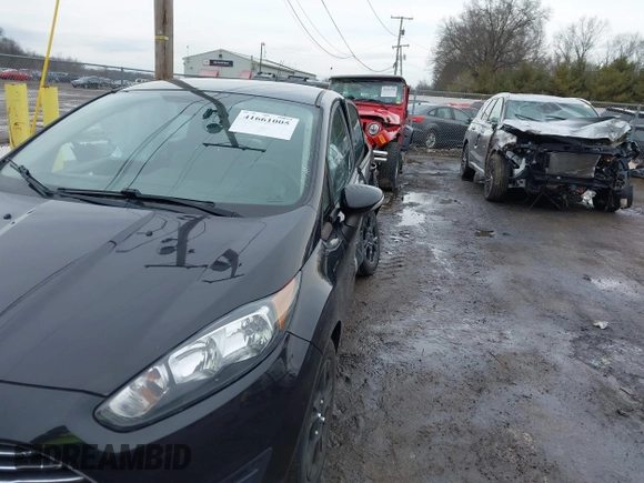 2014 Ford Fiesta SE with VIN 3FADP4BJ8EM159613, listed as a IAAI auction lot 41661005 with 100,006 mi miles. Bid and sale history available at carsss.com. Image 6.
