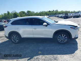 2019 Mazda CX-9 Touring z VIN JM3TCACY3K0333931, wystawiony jako IAAI lot #41968519 z przebiegiem 102 992 mil mil oraz . Historia ofert i sprzedaży dostępna na DreamBid. Obrazek 13.