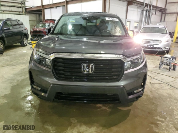 2023 Honda Ridgeline RTL-E with VIN 5FPYK3F72PB050212, listed as a Copart auction lot 48263915 with 14,472 mi miles and Clean Title. Bid and sale history available at carsss.com. Image 5.