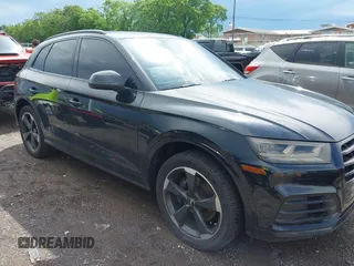 2019 Audi SQ5 Premium Plus z VIN WA1B4AFY4K2070490, wystawiony jako IAAI lot #42163122 z przebiegiem 105 890 mil mil oraz . Historia ofert i sprzedaży dostępna na DreamBid. Obrazek 1.