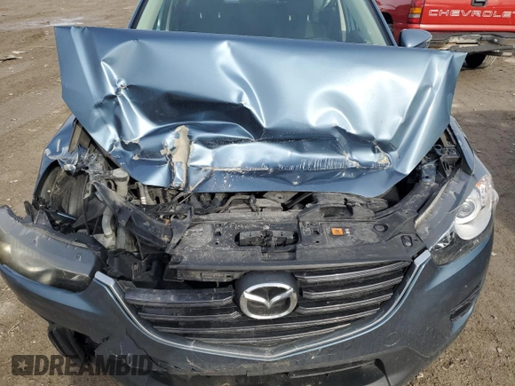 2016 Mazda CX-5 Sport with VIN JM3KE2BY0G0703866, listed as a Copart auction lot 43708185 with 186,790 mi miles and Salvage Title. Bid and sale history available at carsss.com. Image 14.