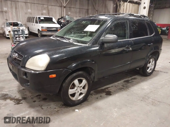 2006 Hyundai Tucson GL with VIN KM8JM12B26U325338, listed as a IAAI auction lot 41809578 with 127,210 mi miles. Bid and sale history available at carsss.com. Image 2.