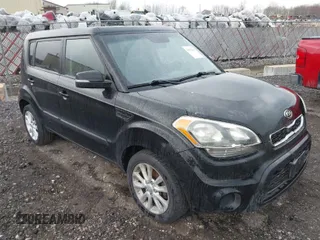 2012 Kia Soul + with VIN KNDJT2A68C7748646, listed as a IAAI auction lot 42072847 with 129,357 mi miles. Bid and sale history available at carsss.com. Image 1.