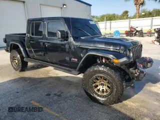 2020 Jeep Gladiator Rubicon z VIN 1C6JJTBG5LL101185, wystawiony jako Copart lot #83012014 z przebiegiem Nie podano mil oraz Nie do naprawy • Non repairable. Historia ofert i sprzedaży dostępna na DreamBid. Obrazek 4.