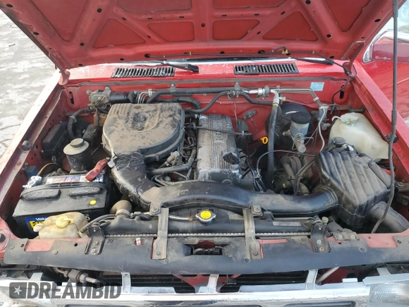 1994 Nissan Frontier with VIN 1N6SD11SXRC360680, listed as a Copart auction lot 84196824 with 105,338 mi miles and Salvage title. Bid and sale history available at DreamBid. Image 12.