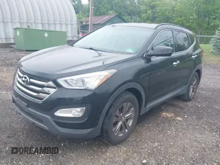2014 Hyundai Santa Fe z VIN 5XYZUDLB9EG224174, wystawiony jako IAAI lot #42244140 z przebiegiem 84 341 mil mil oraz . Historia ofert i sprzedaży dostępna na DreamBid. Obrazek 17.